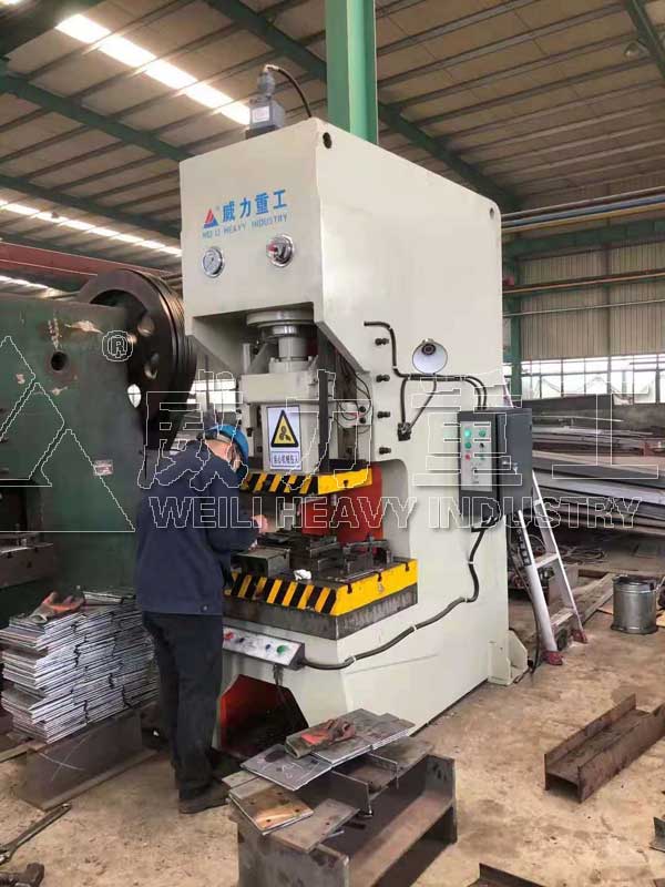 100噸液壓沖床在板材沖孔落料中應(yīng)用